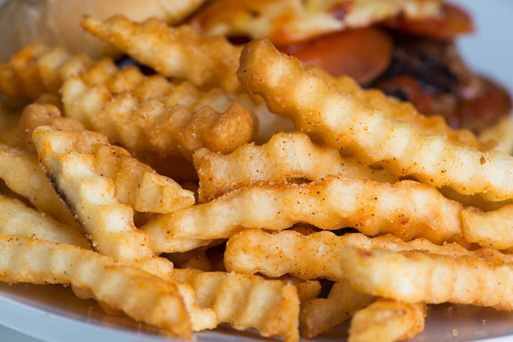 air fried frozen French fries on tray